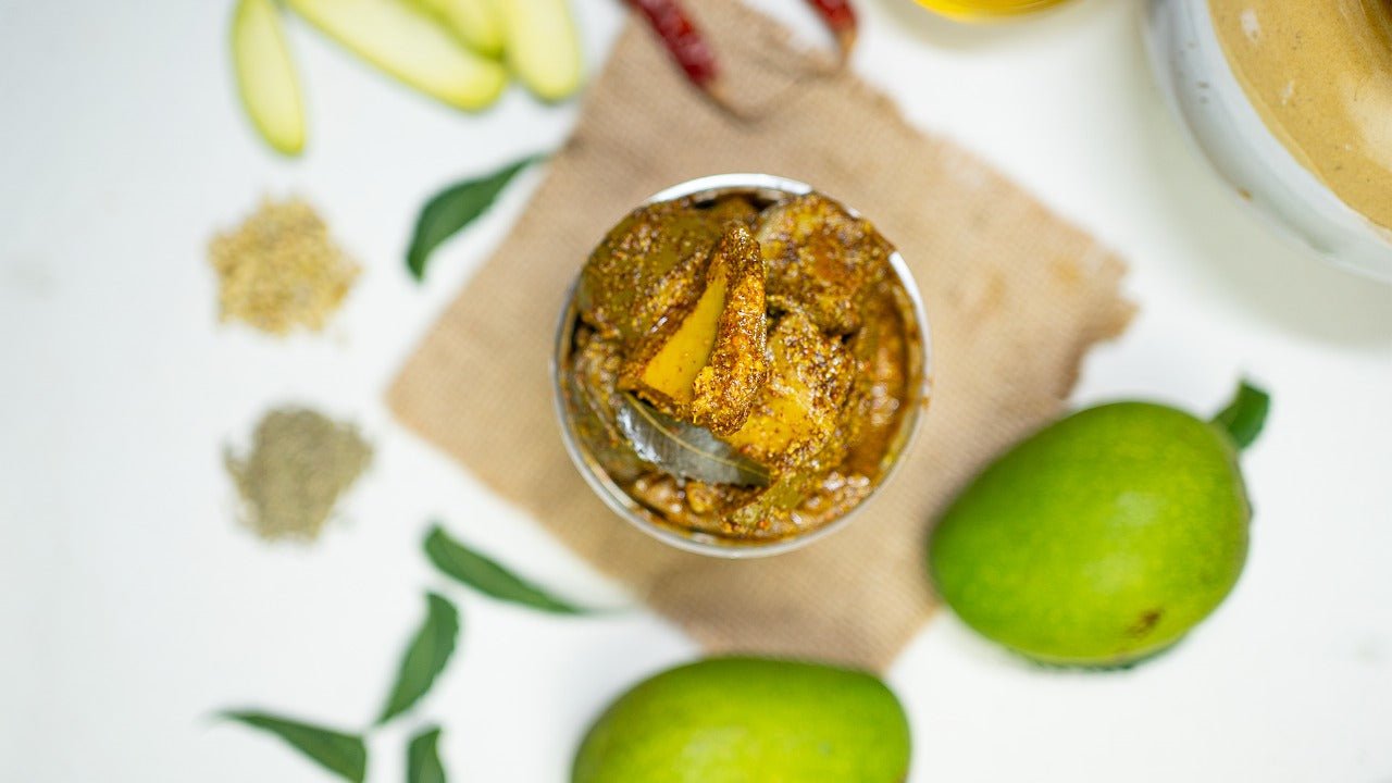Homemade mango pickle infused with neem and turmeric for good skin health