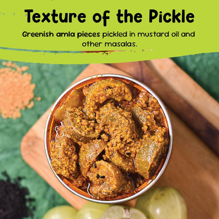 Close-up texture of amla ka achar with greenish Indian gooseberry pieces in mustard oil and masala