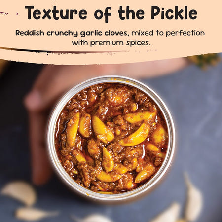 Close-up texture of lahsun ka achar with reddish crunchy garlic cloves in mustard oil and spices
