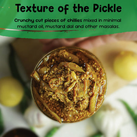 Close-up of green chilli pickle with crunchy cut chillies in mustard dal, lemon juice and masalas