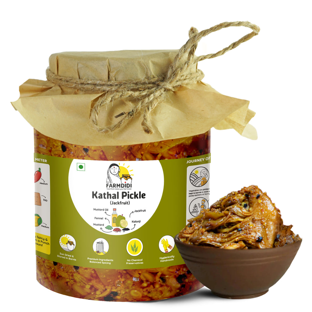 
                  
                    Jar of 1kg Kathal Pickle by FarmDidi with a bowl of pickles 
                  
                