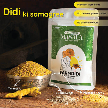 Mirchi lonche masala with turmeric, cumin seeds and mustard seeds in a bowl