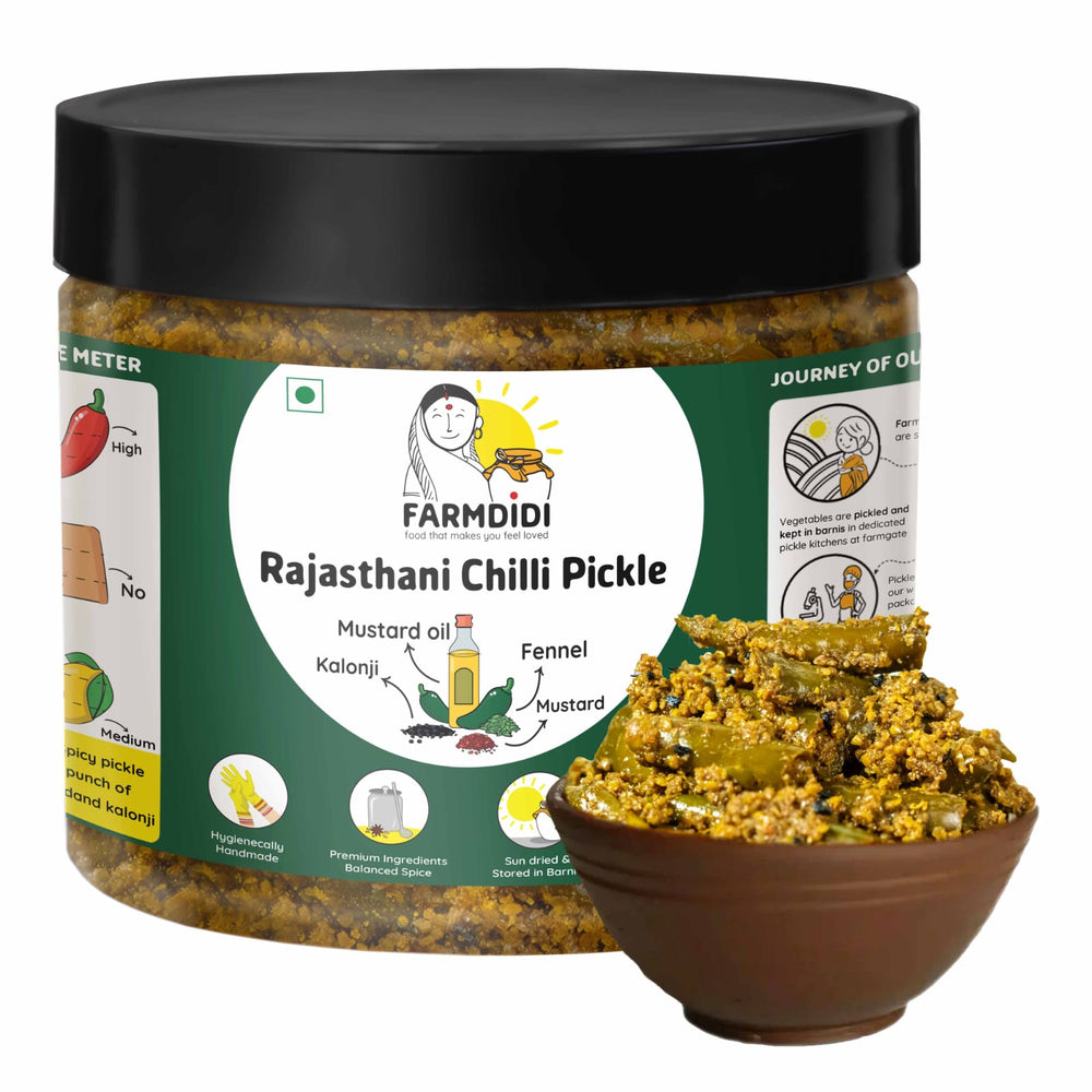 
                  
                    FarmDidi 325g Rajasthani Green Chilli Pickle made with mustard oil, fennel and kalonji, homemade with no preservatives

                  
                
