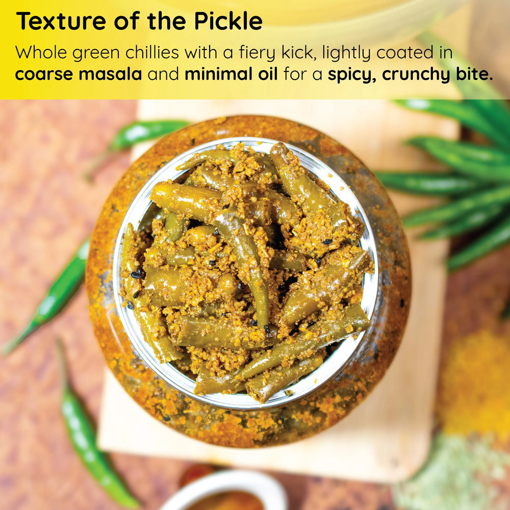 
                  
                    Texture of FarmDidi's Homemade Rajasthani Green Chilli Pickle coated in coarse masala
                  
                
